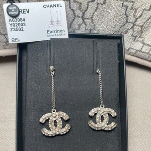 Authentic CHANEL Silver and Crystal Logo Earrings
